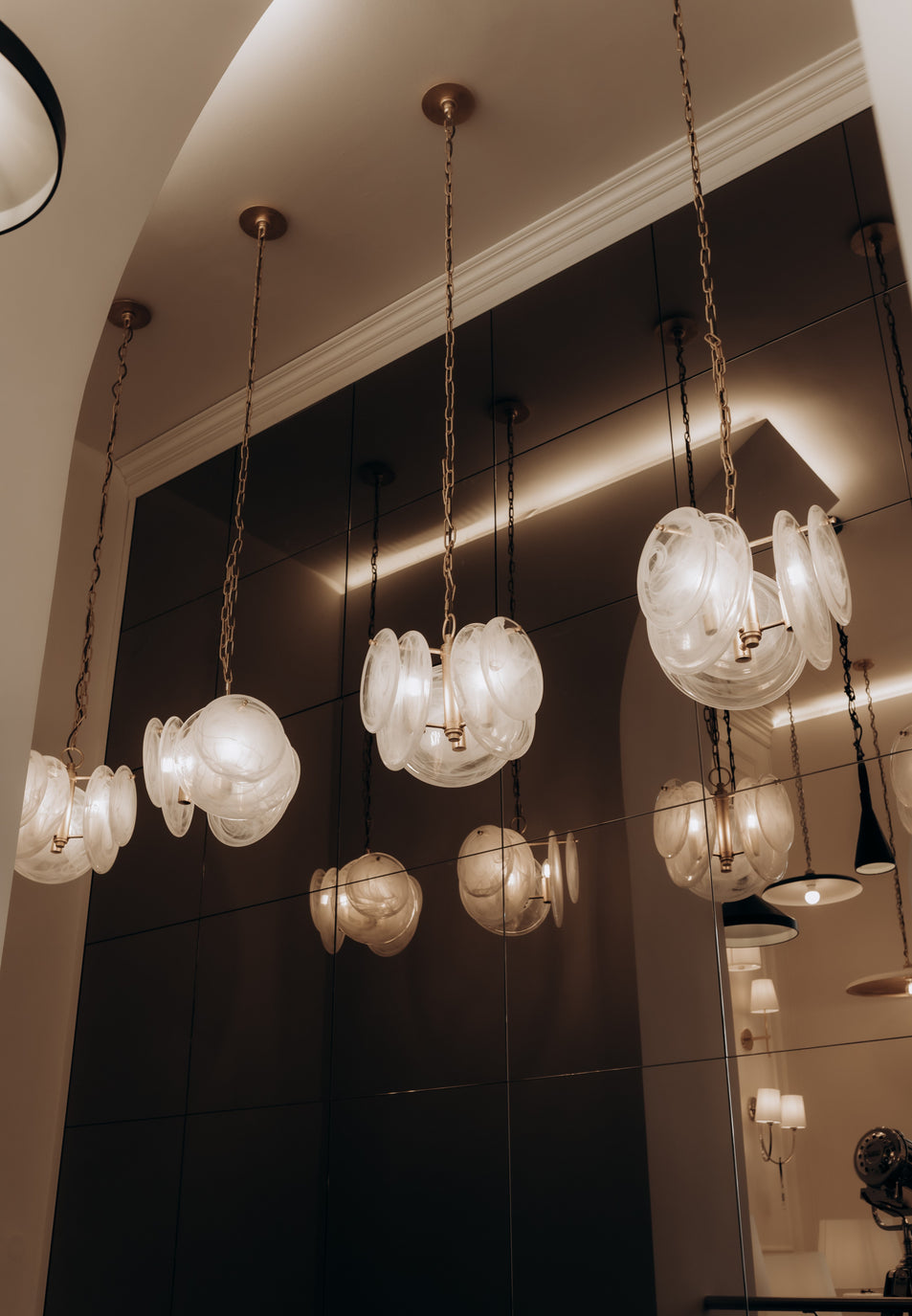 Loire Petite Chandelier, a premium Chandelier light by Visual Comfort & Co. Close - up image of its design.