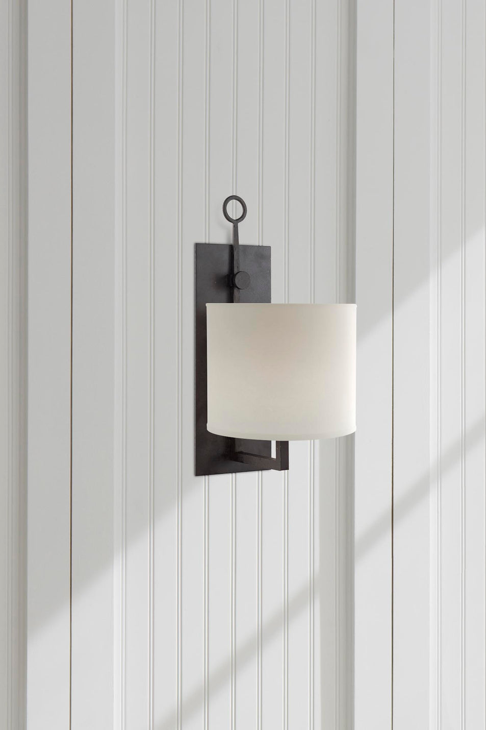 Aspen Iron Wall Lamp, a premium Decorative light by Visual Comfort. Close - up image of its design.