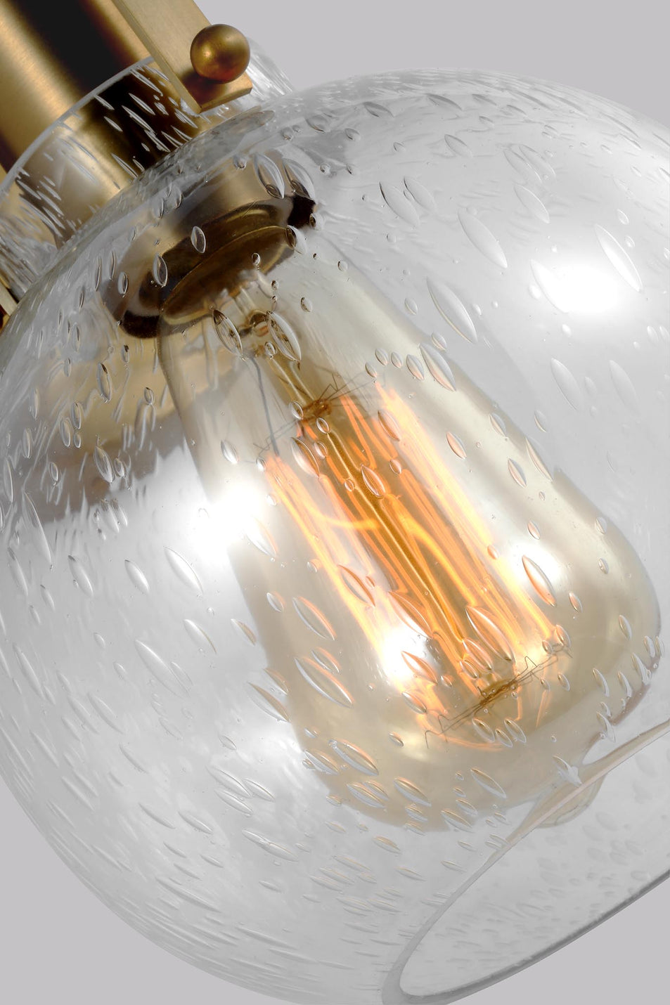 Clara 1 - Light Sconce in Burnished Brass with Seeded Glass