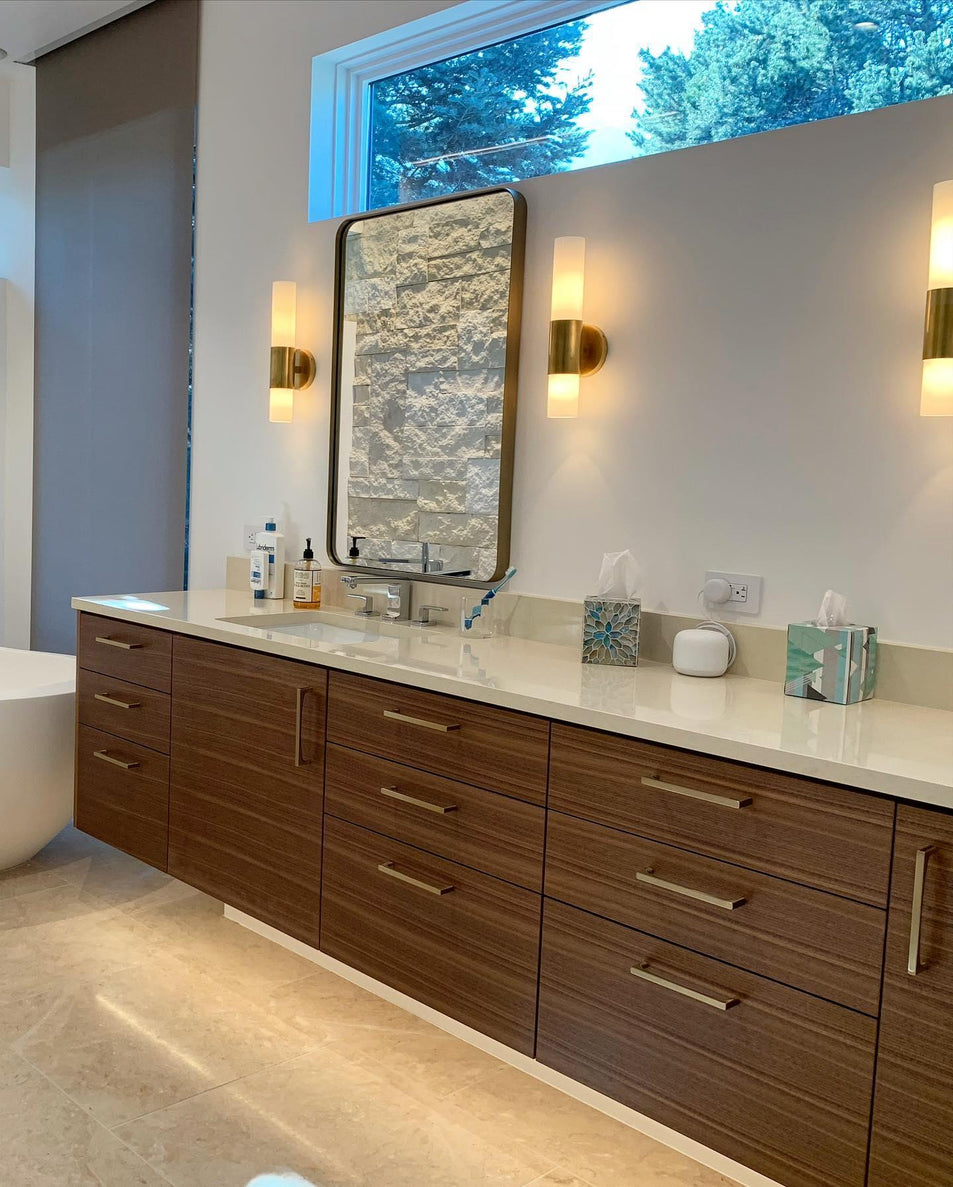 Penz Medium Cylindrical Sconce, a premium Bath light by Visual Comfort & Co. Close - up image of its design.