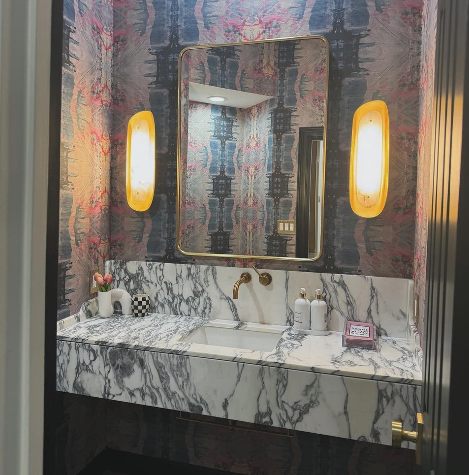 Samos Tall Sculpted Sconce, a premium Decorative light by Visual Comfort & Co. Close - up image of its design.