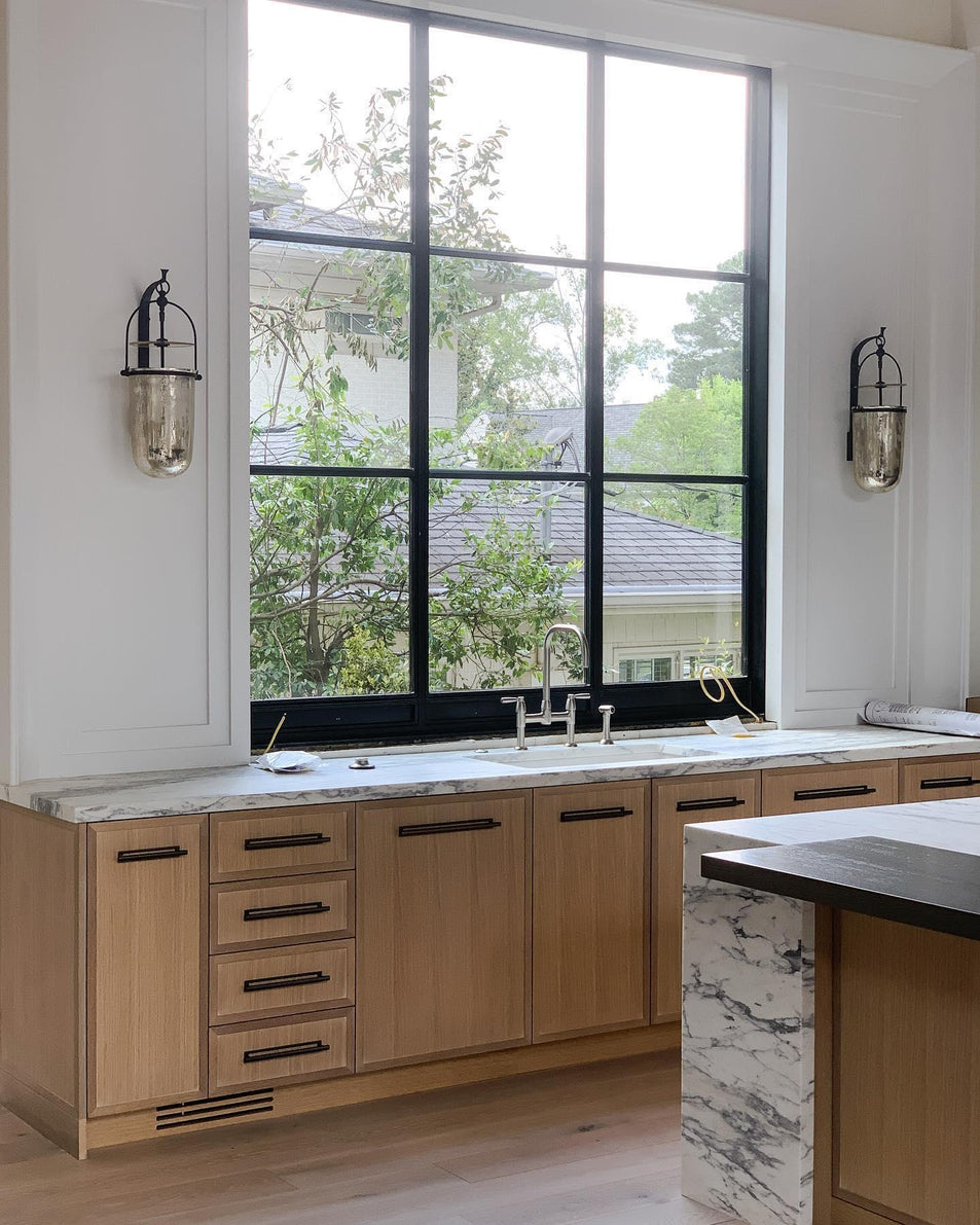 Lorford Medium Sconce, a premium Decorative light by Visual Comfort & Co. Close - up image of its design.
