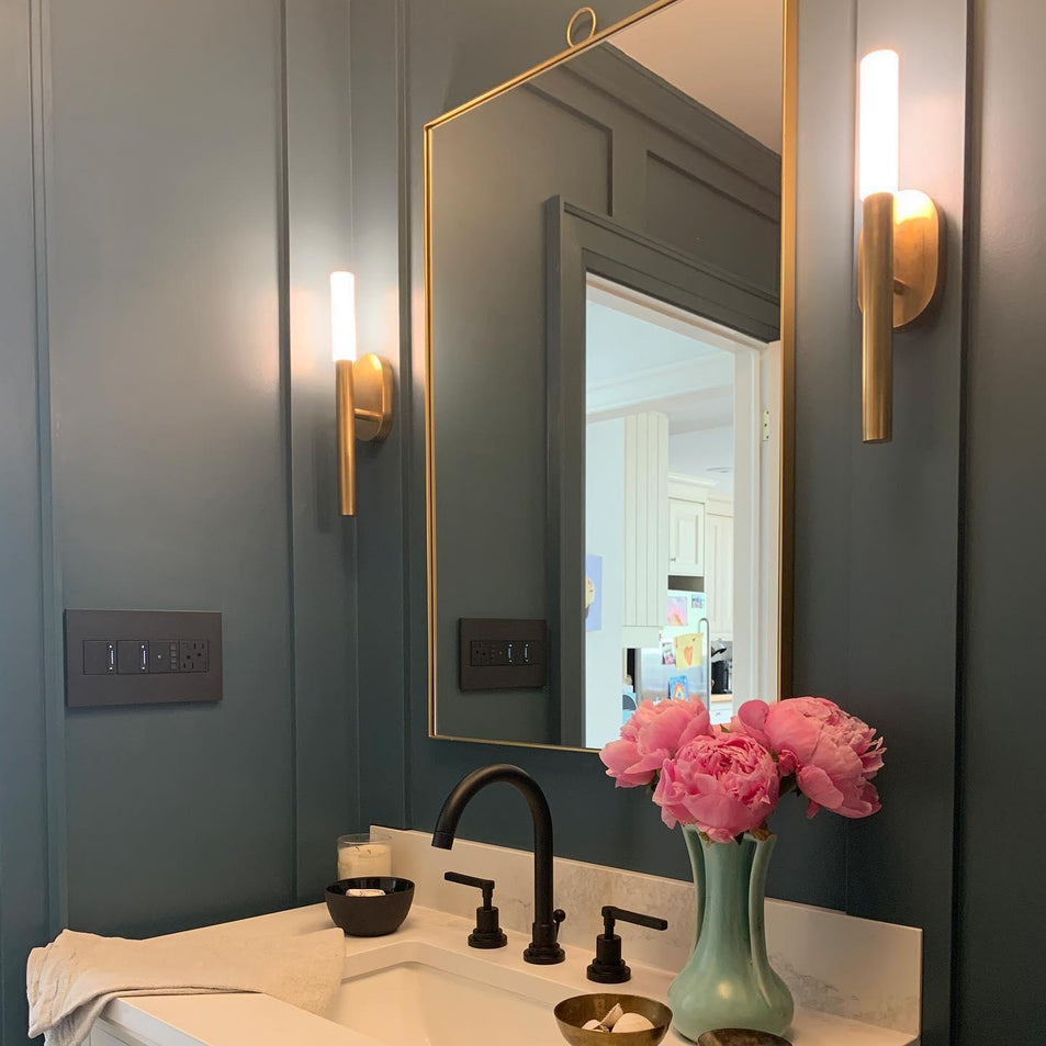 Rousseau Medium Bath Sconce, a premium Decorative light by Visual Comfort & Co. Close - up image of its design.